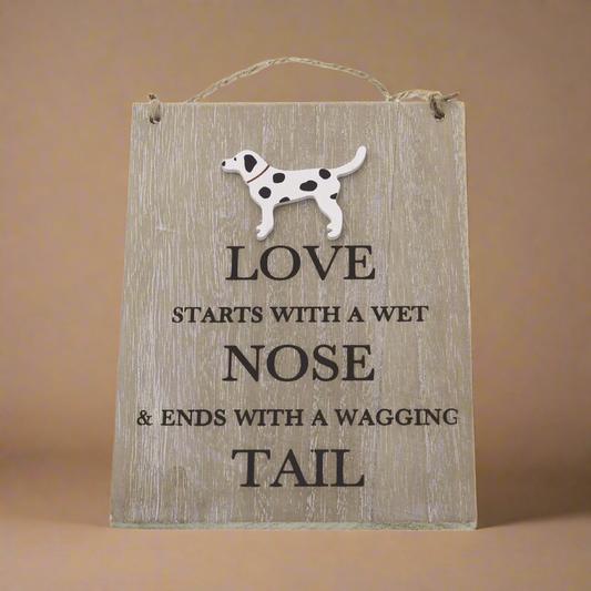 Wet Nose and wagging tail sign