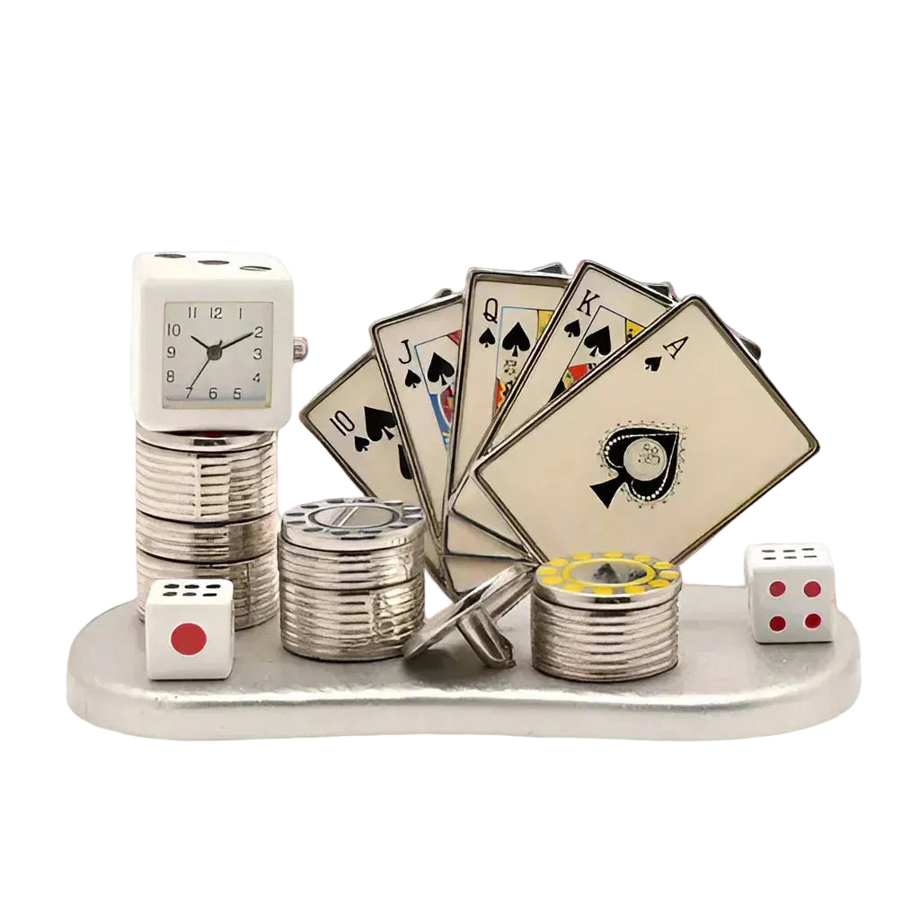 Casino-themed decorative set with playing cards, dice, and a clock on a red background
