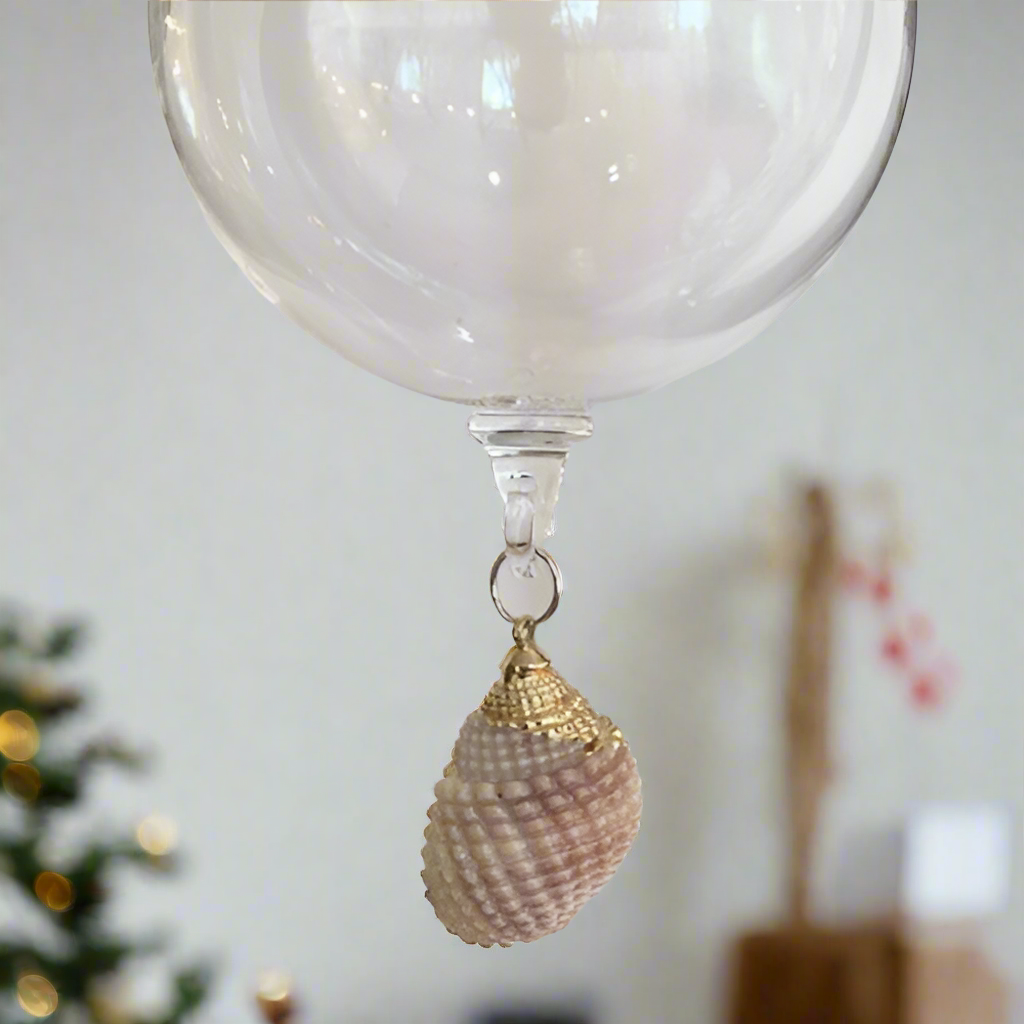 Clear Glass Ball with Hanging Triton Shell