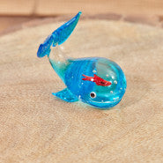 Glass Whale with red fish inside