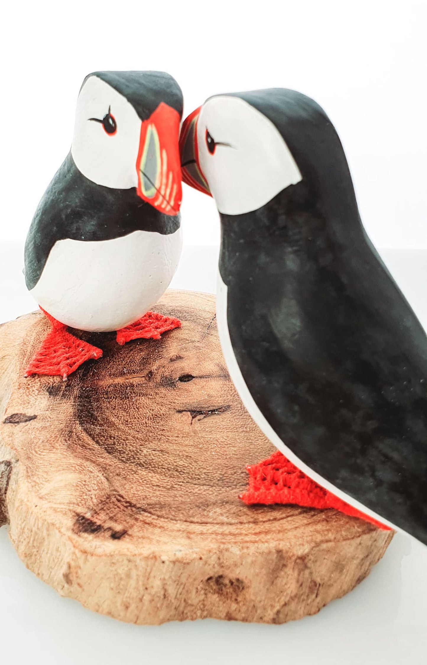 2 Wooden Puffins on a Plinth