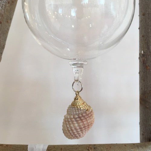 Clear Glass Ball with Hanging Triton Shell