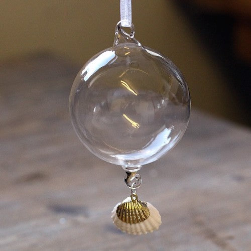 Clear Glass Ball with Hanging Creamy White Cockle Shell on Gilded Hanger